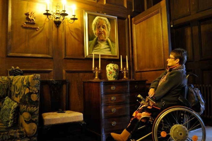 Tanya Raabe with one of her paintings at Croft Castle.